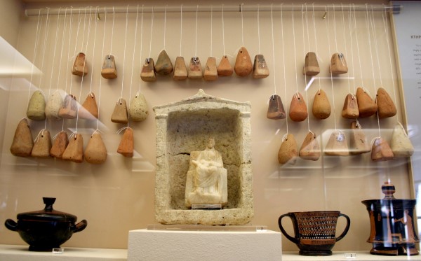 Display of Loom Weights in a Greek museum